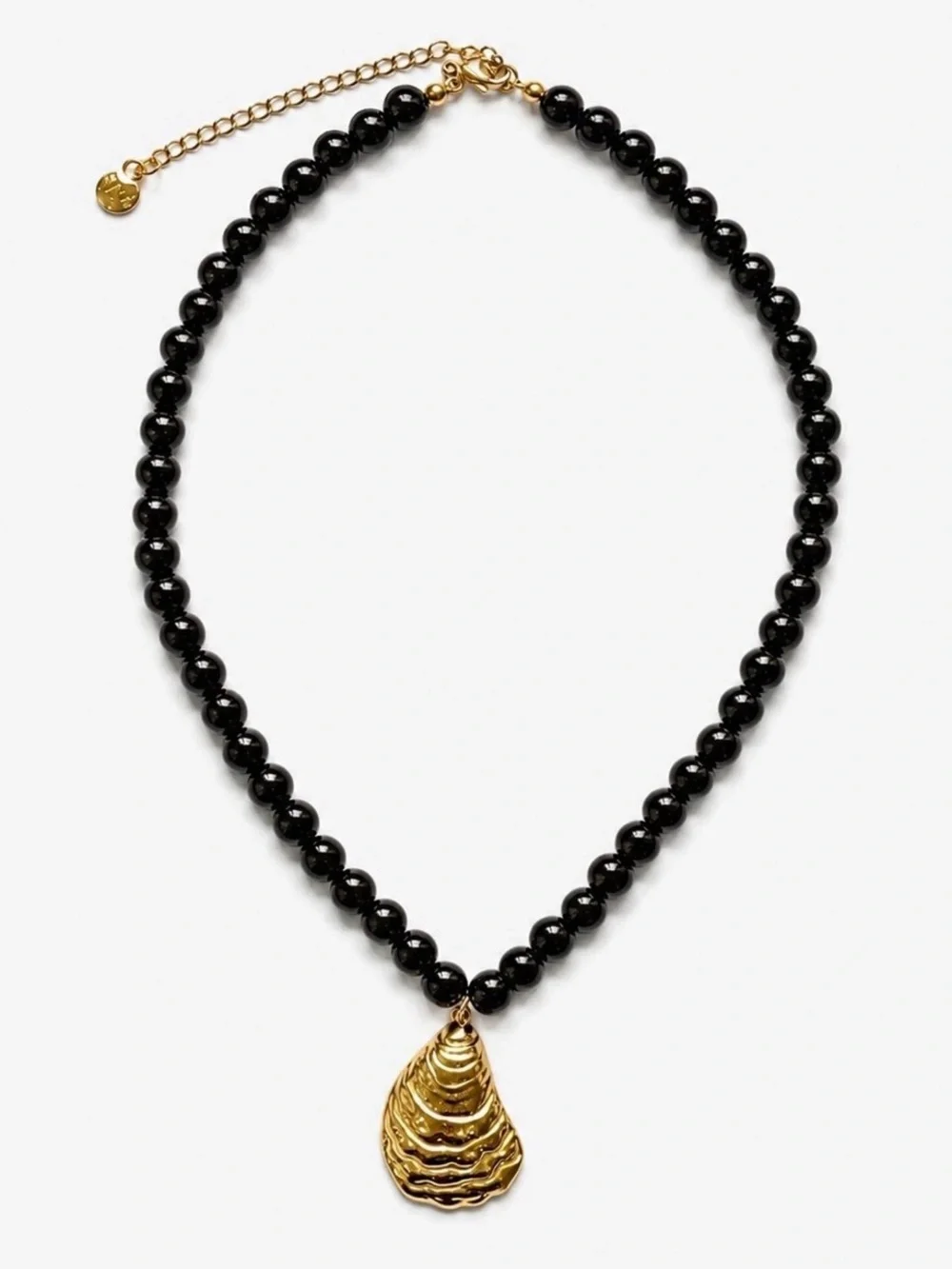Gold Shell Pendant on Black Beaded Necklace